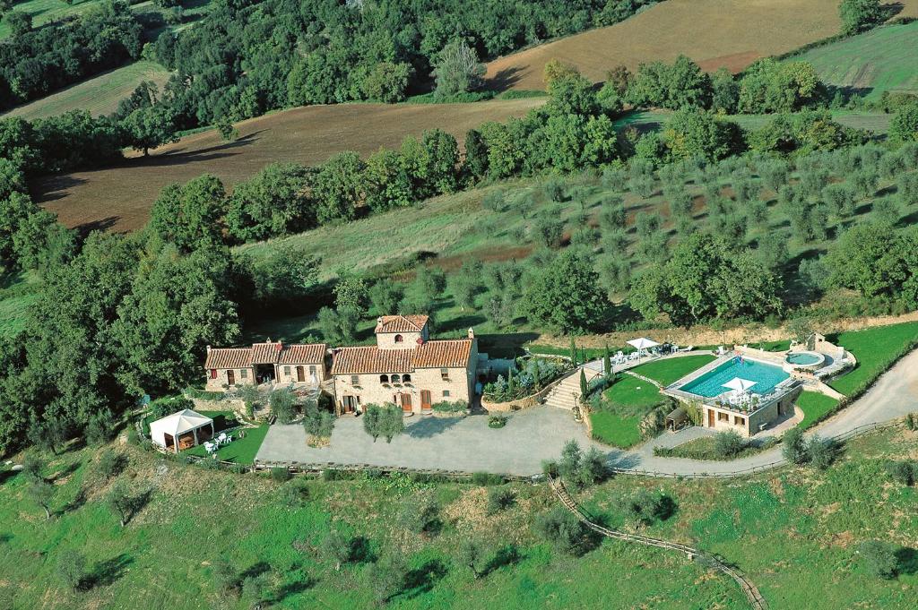 an aerial view of a house on a hill at Podere Santa Maria in Monte Antico