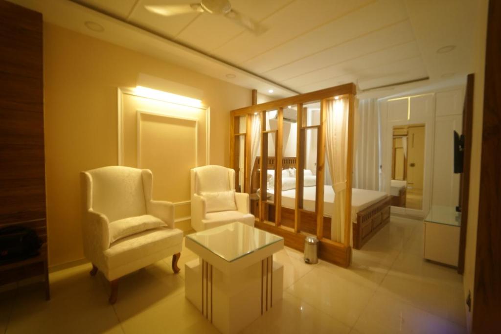 Posezení v ubytování Myst Luxury stays