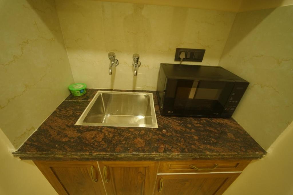 Kuchyň nebo kuchyňský kout v ubytování Myst Luxury stays