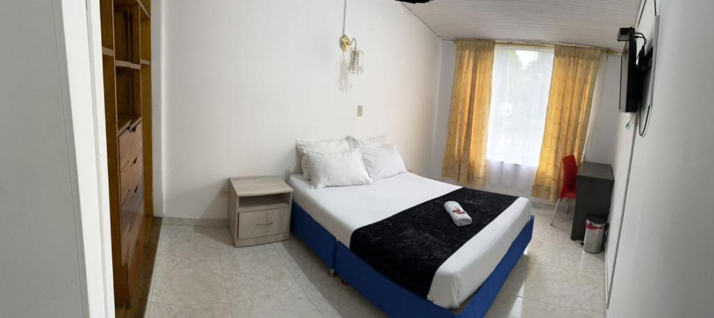Postel nebo postele na pokoji v ubytování HOTEL EMBASSY STAR