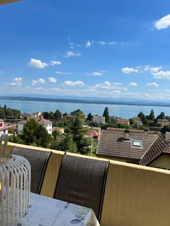a view of the ocean from a balcony at Alpes 54 in Neuchâtel