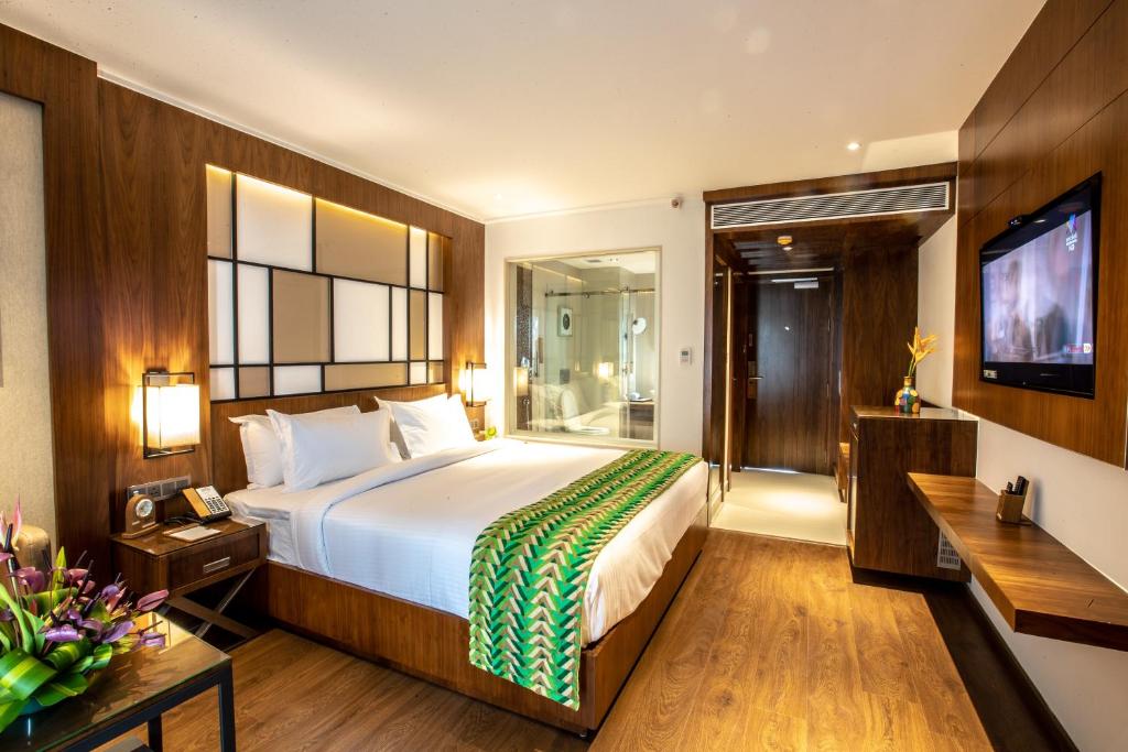 Postel nebo postele na pokoji v ubytování Hotel Span International
