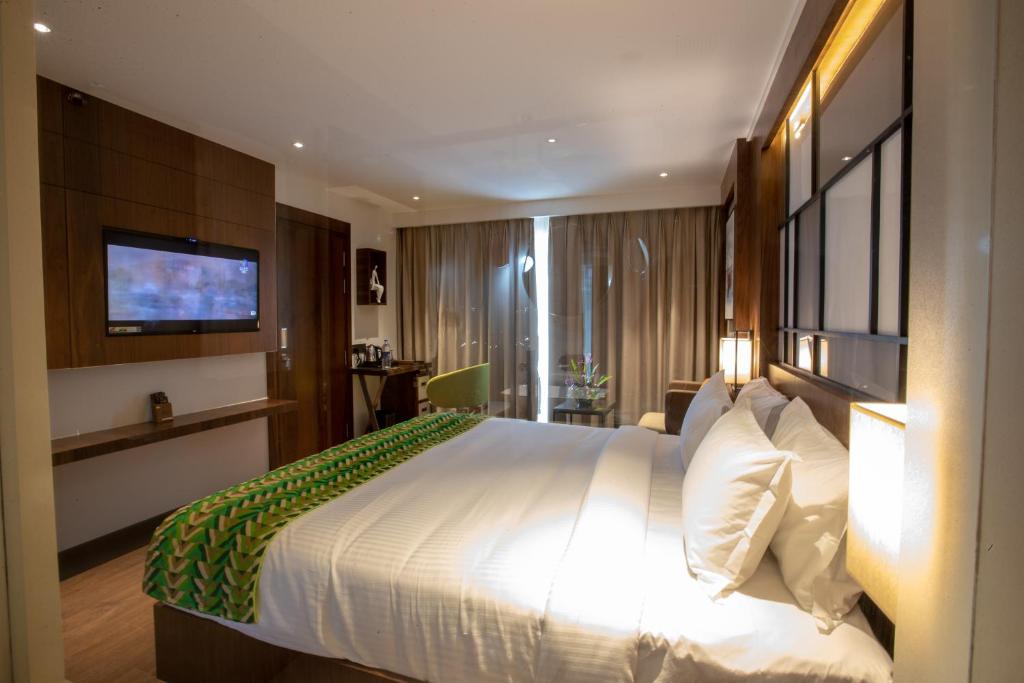 Postel nebo postele na pokoji v ubytování Hotel Span International