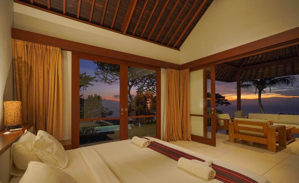 Postel nebo postele na pokoji v ubytování Villa Vanna - Lombok