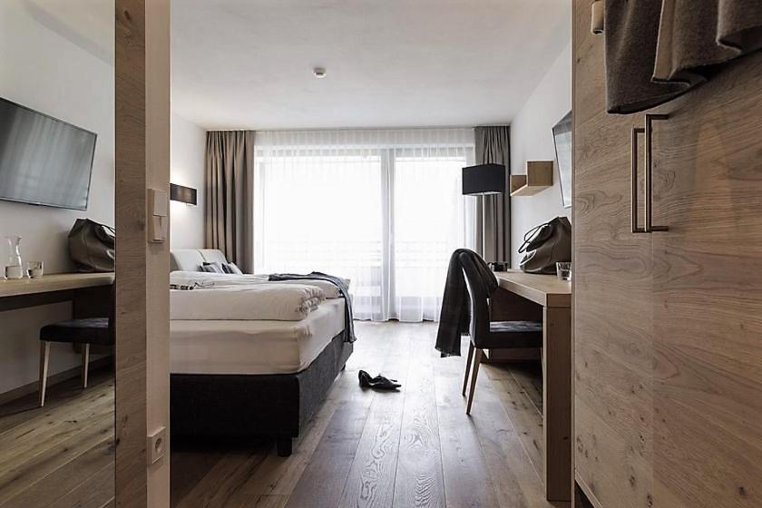 Postel nebo postele na pokoji v ubytování Eden Boutique Hotel