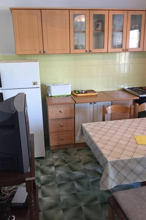 Kuchyň nebo kuchyňský kout v ubytování Apartment Savar 8079c