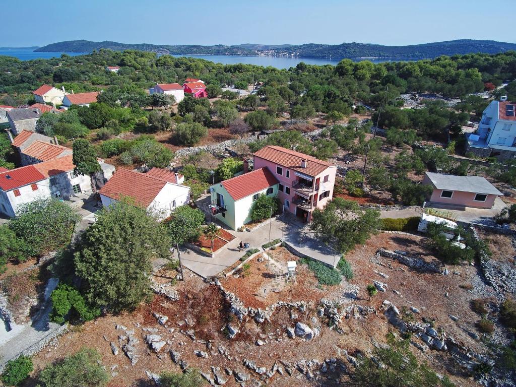 an aerial view of a house on a hill at Apartments with a parking space Bozava, Dugi otok - 8124 in Božava