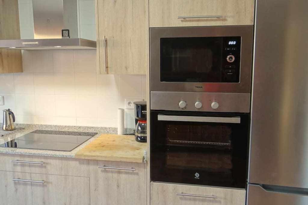 Kuchyň nebo kuchyňský kout v ubytování Cuberto Darriba Casa restaurada en Canedo