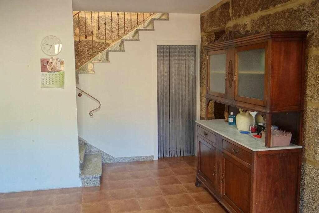 Kuchyň nebo kuchyňský kout v ubytování Cuberto Darriba Casa restaurada en Canedo