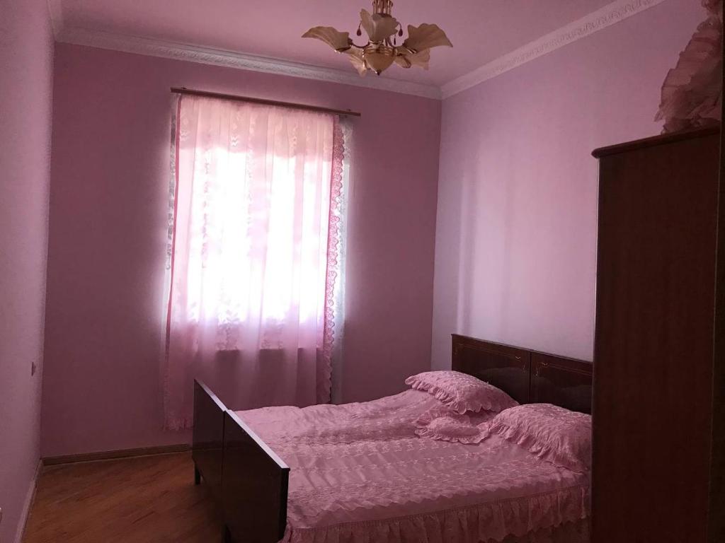 Postel nebo postele na pokoji v ubytování Guest House Sevan