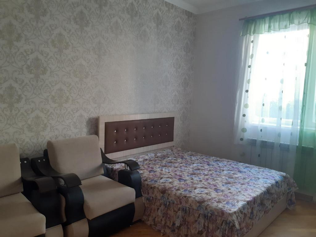 Postel nebo postele na pokoji v ubytování Guest House Sevan