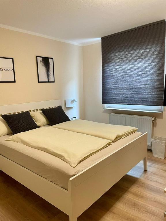 Postel nebo postele na pokoji v ubytování Gasthaus Stammbaum