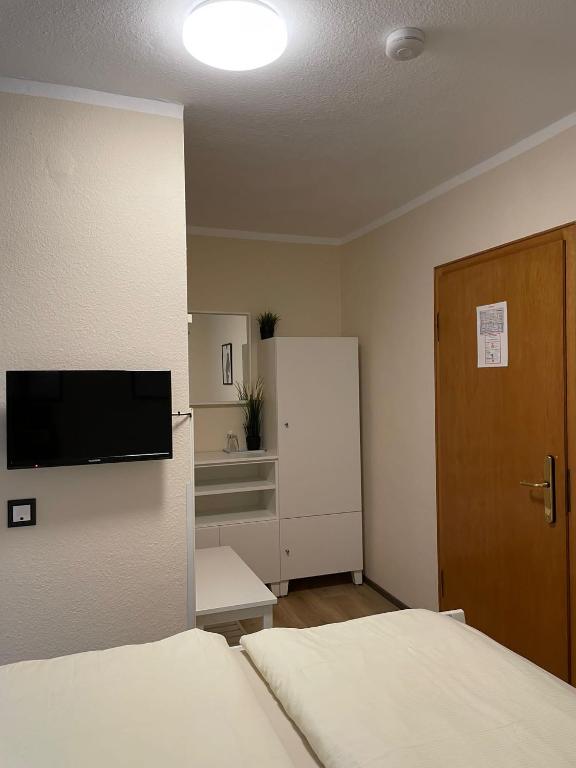 Postel nebo postele na pokoji v ubytování Gasthaus Stammbaum