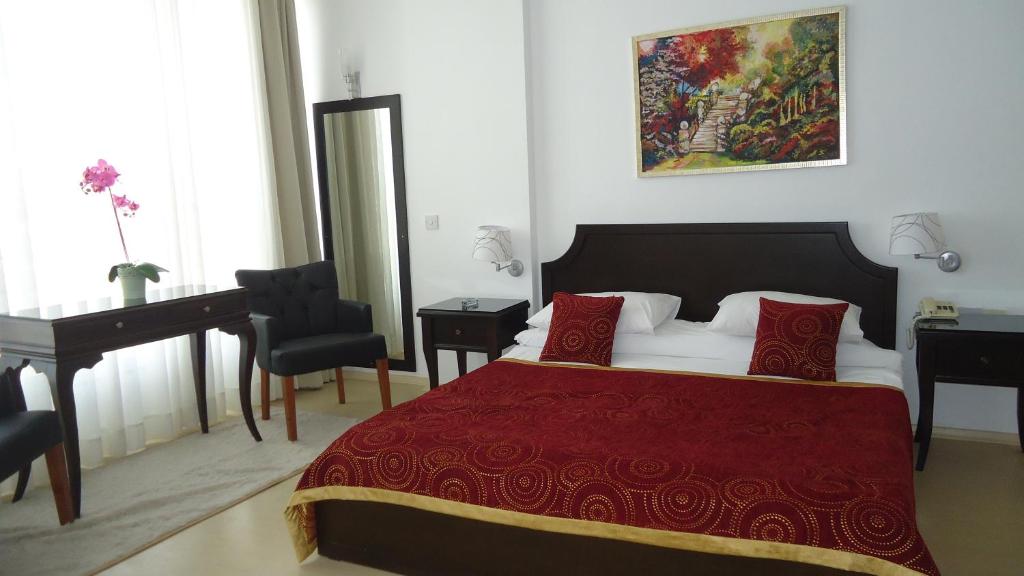 Postel nebo postele na pokoji v ubytování Ada Beach Hotel