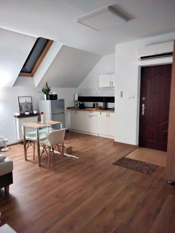Kuchyňa alebo kuchynka v ubytovaní Urokliwy Zakątek to apartament tylko dla Państwa