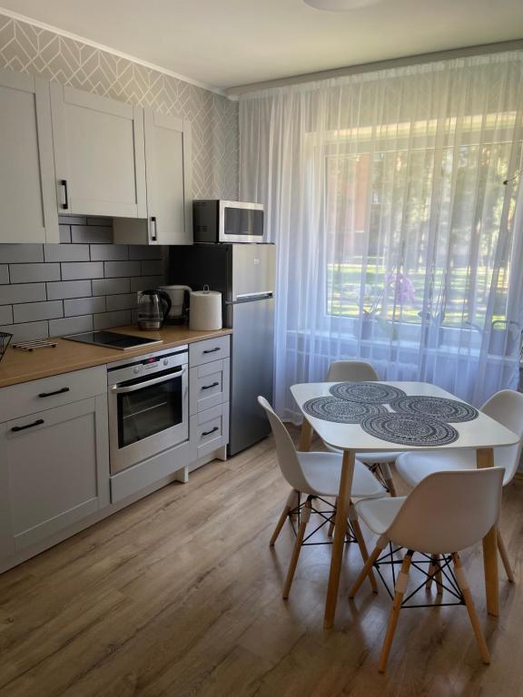 Virtuvė arba virtuvėlė apgyvendinimo įstaigoje Nice to stay