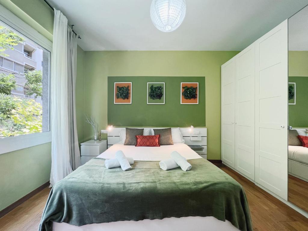 Postel nebo postele na pokoji v ubytování Stay U-nique Apartments Aribau II