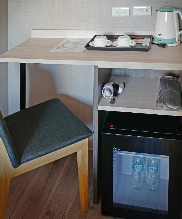 Kuchyň nebo kuchyňský kout v ubytování Comma Boutique Hotel
