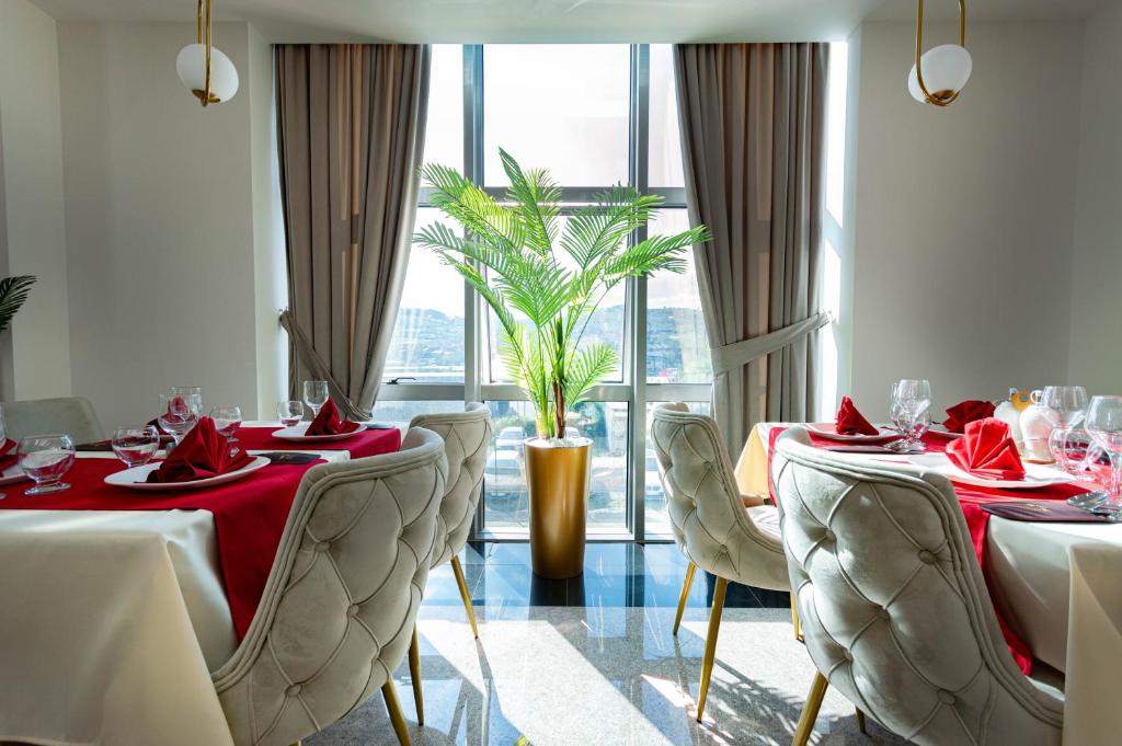 Posezení v ubytování Hotel IDEAL Deluxe