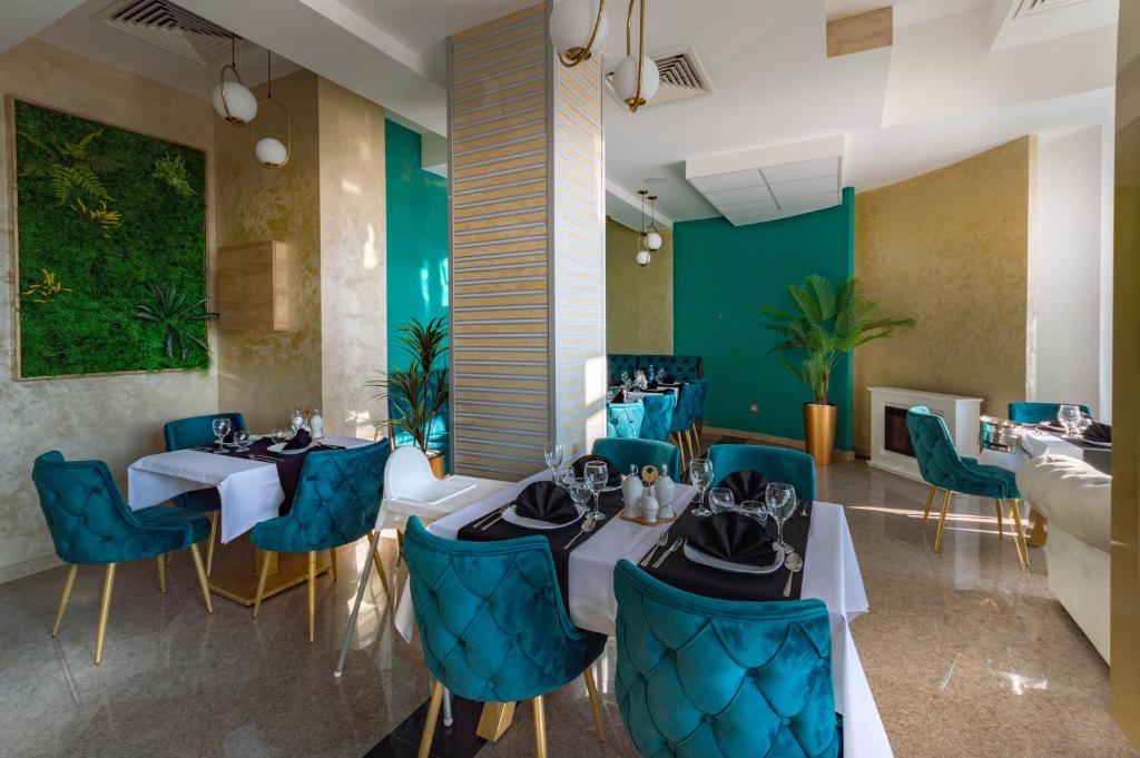 Posezení v ubytování Hotel IDEAL Deluxe