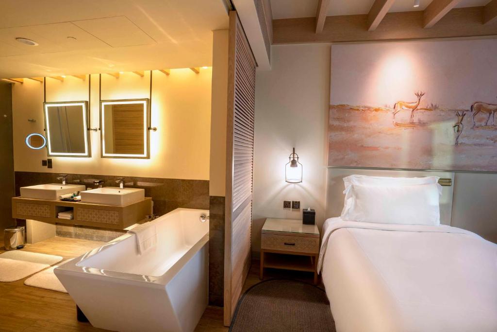 Vannituba majutusasutuses Saadiyat Rotana Resort and Villas