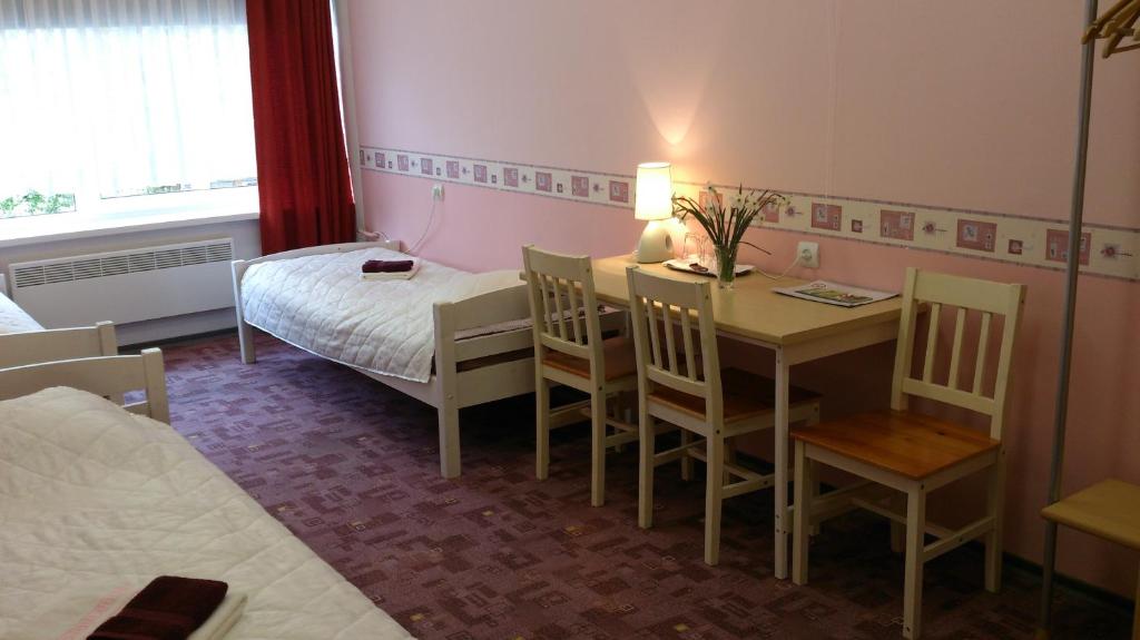 Postel nebo postele na pokoji v ubytování Sõrve Guest House