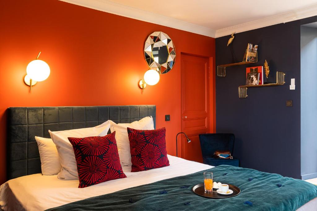 Postel nebo postele na pokoji v ubytování Hôtel - Restaurant Le Globe