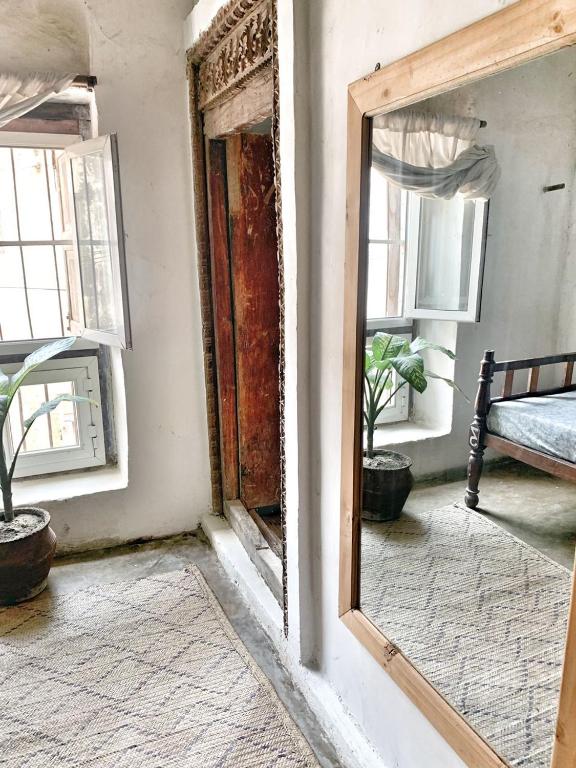 Postel nebo postele na pokoji v ubytování Firefly Boutique Lodge