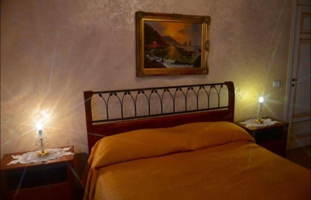 Een bed of bedden in een kamer bij Villa Brezza Marina