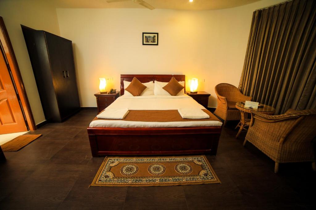 Postel nebo postele na pokoji v ubytování WOW Bison Woods Organic Veg Resort - Yercaud