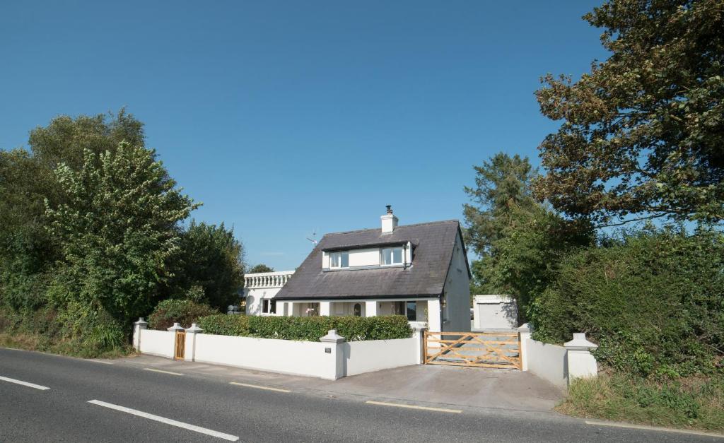 a house on the side of the road at Ballygown Cottage in Torpys Cross Roads