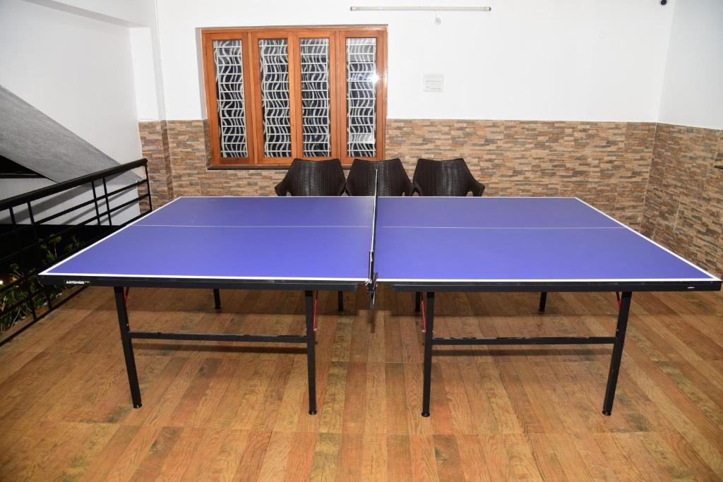 Stolní tenis v ubytování WOW Bison Woods Organic Veg Resort - Yercaud nebo okolí