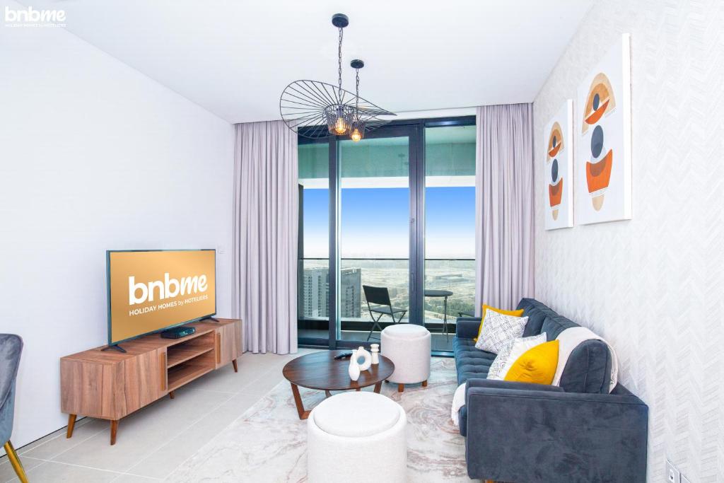 TV a/nebo společenská místnost v ubytování bnbmehomes - Address Beach Resort