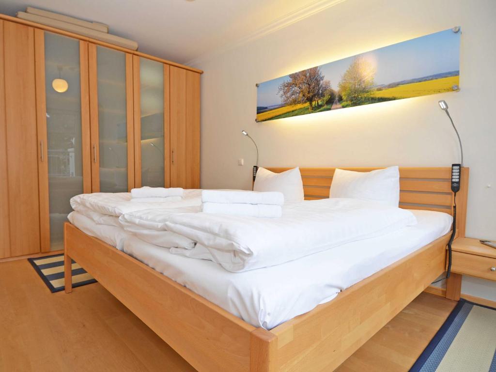 Postel nebo postele na pokoji v ubytování Dünenresidenz Königin Augusta - Apt. 20