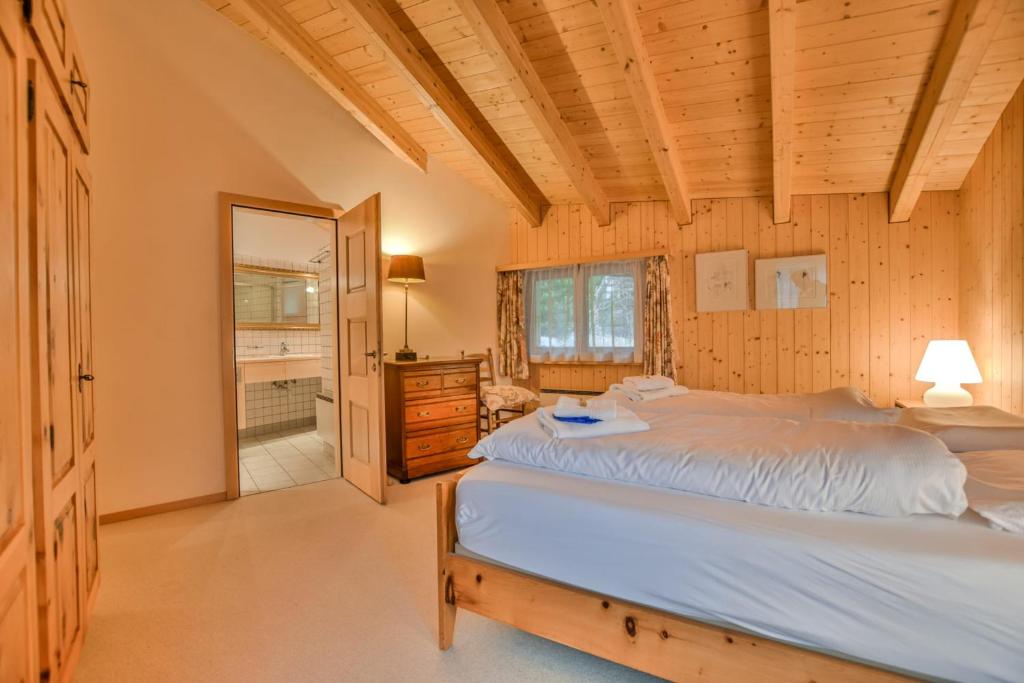 Postel nebo postele na pokoji v ubytování Chalet Arnica