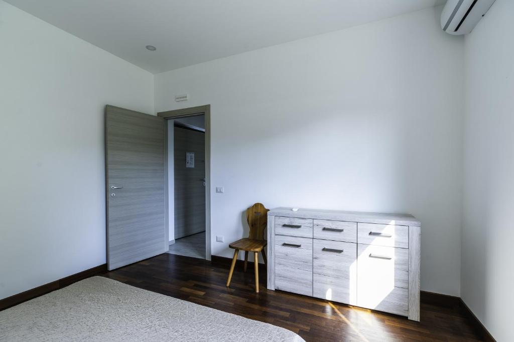 A bed or beds in a room at Tropical House