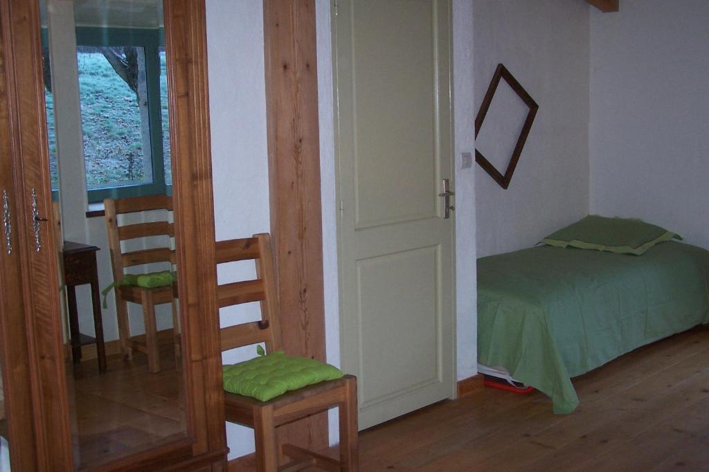 Postel nebo postele na pokoji v ubytování Salomony Chambre d'Hôtes