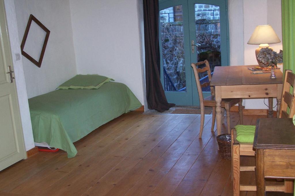 Postel nebo postele na pokoji v ubytování Salomony Chambre d'Hôtes