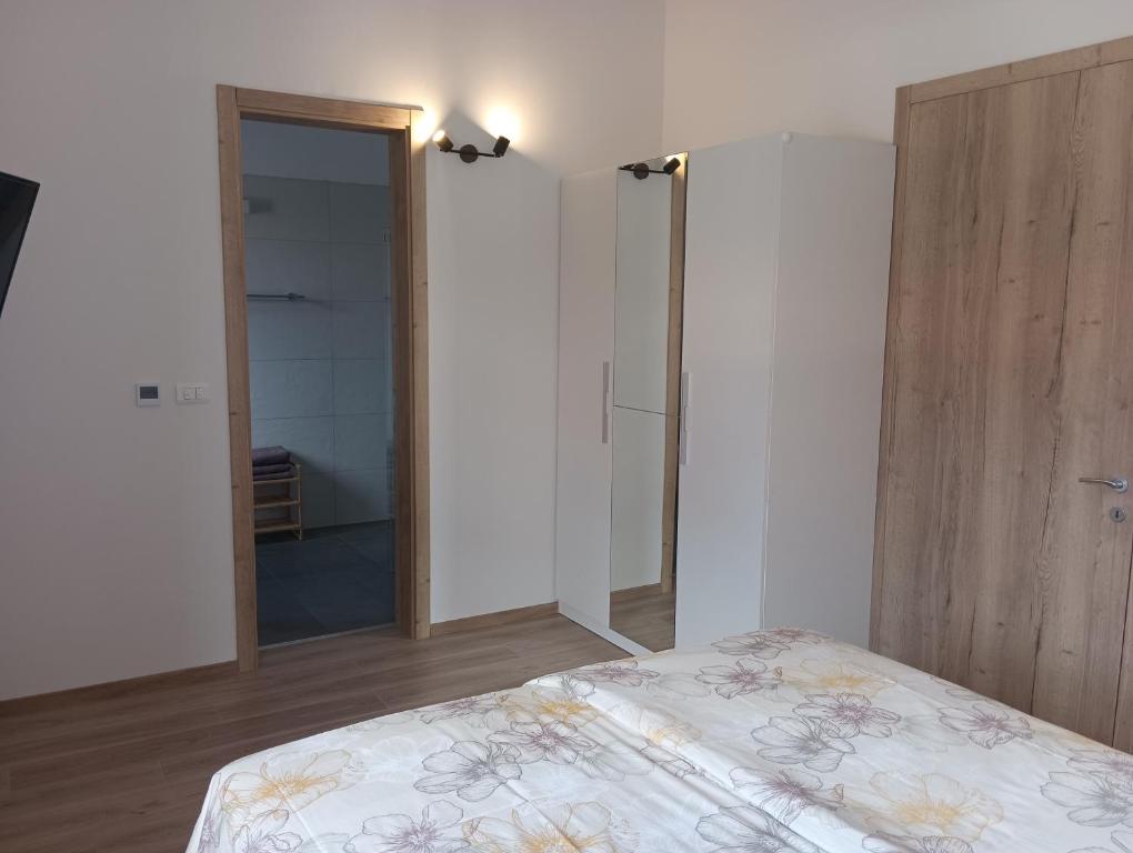 Postel nebo postele na pokoji v ubytování Penthouse Sunset