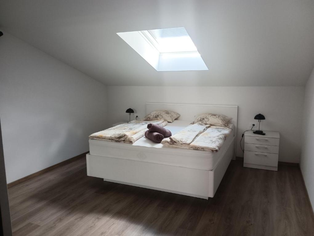 Postel nebo postele na pokoji v ubytování Penthouse Sunset