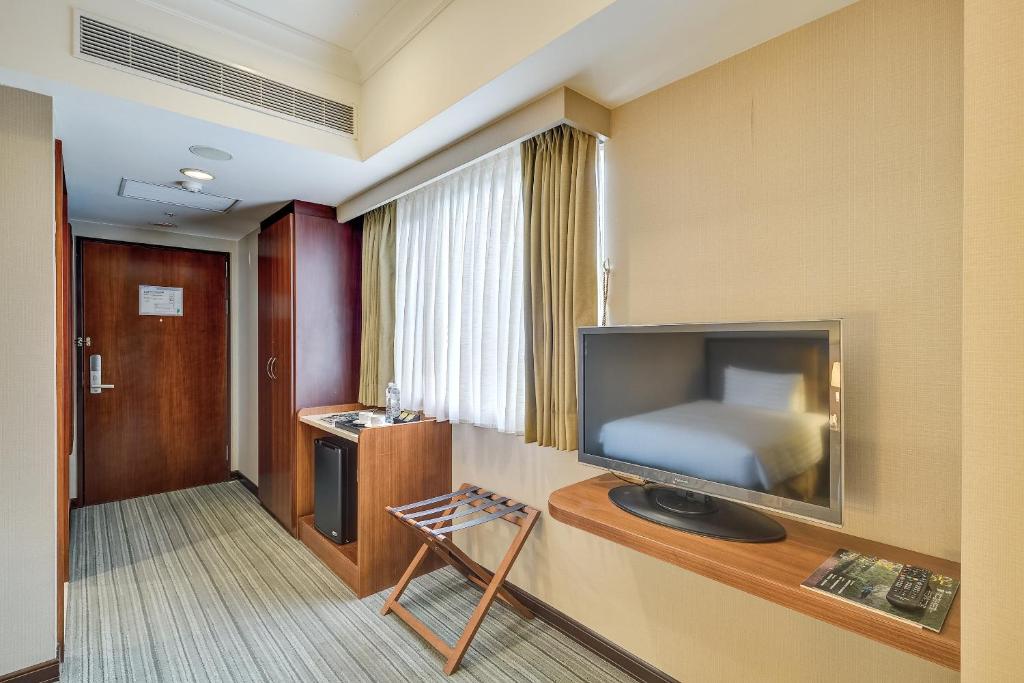 TV a/nebo společenská místnost v ubytování Forte Hotel Xizhi
