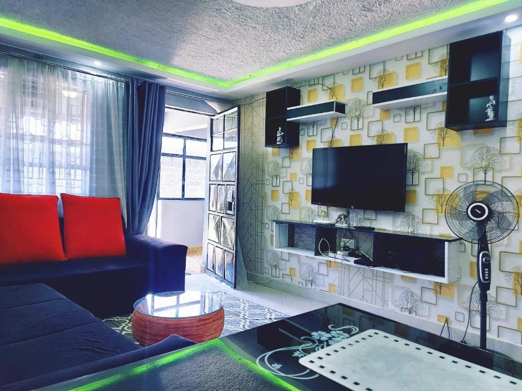TV a/nebo společenská místnost v ubytování Parkview apartments