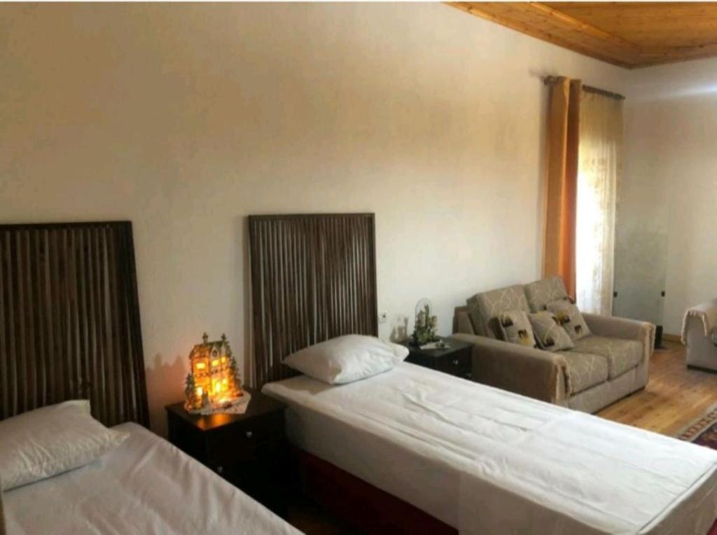 Letto o letti in una camera di MiziriGuestHouse