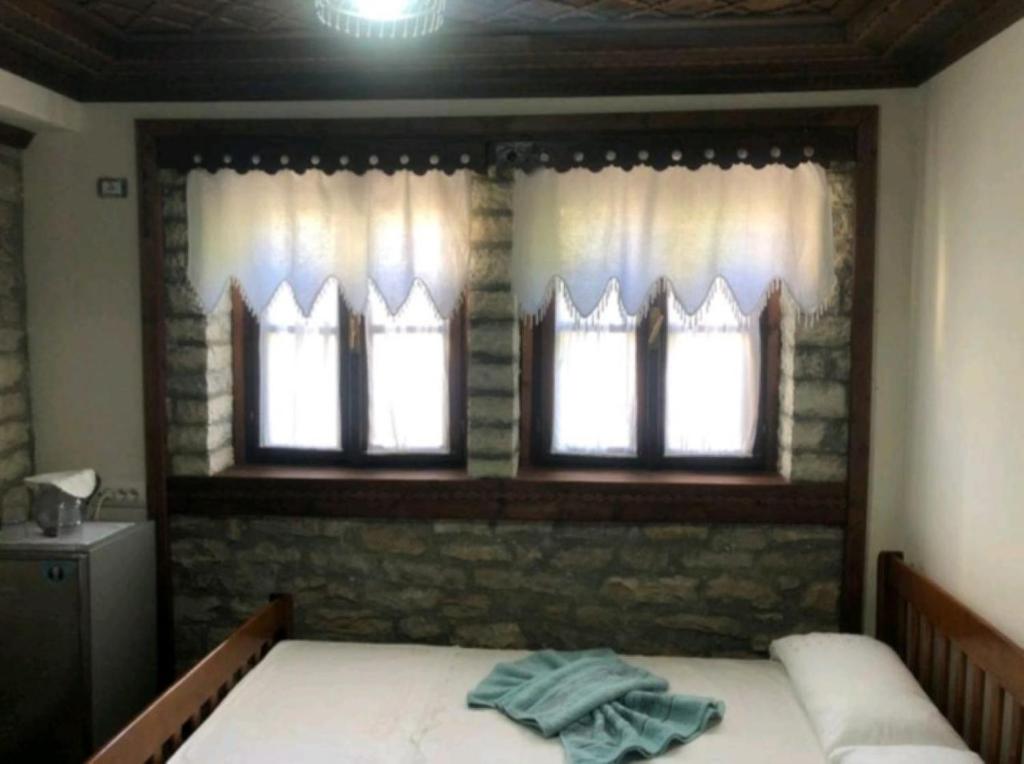 Letto o letti in una camera di MiziriGuestHouse
