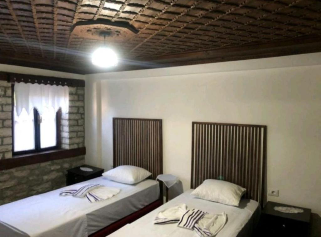 Letto o letti in una camera di MiziriGuestHouse