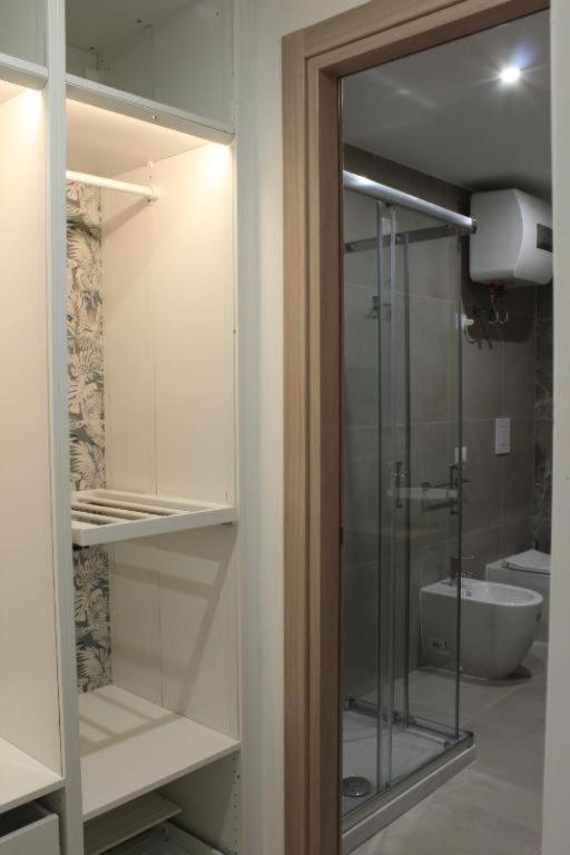 A bathroom at Luxury Apartment with balcony garden view