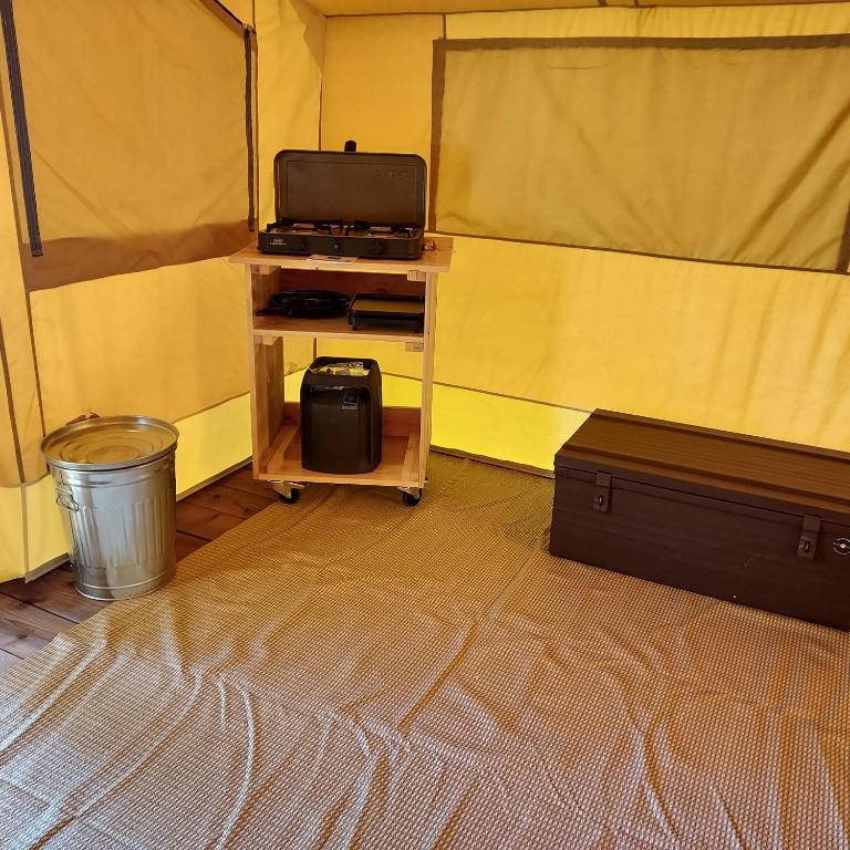 Posezení v ubytování CAMPING ONLYCAMP CHAMARGES