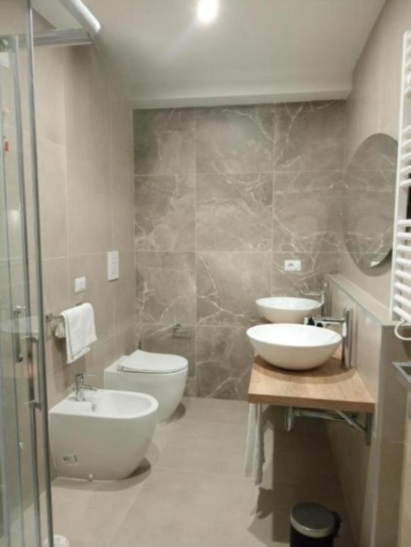 A bathroom at Luxury Apartment with balcony garden view