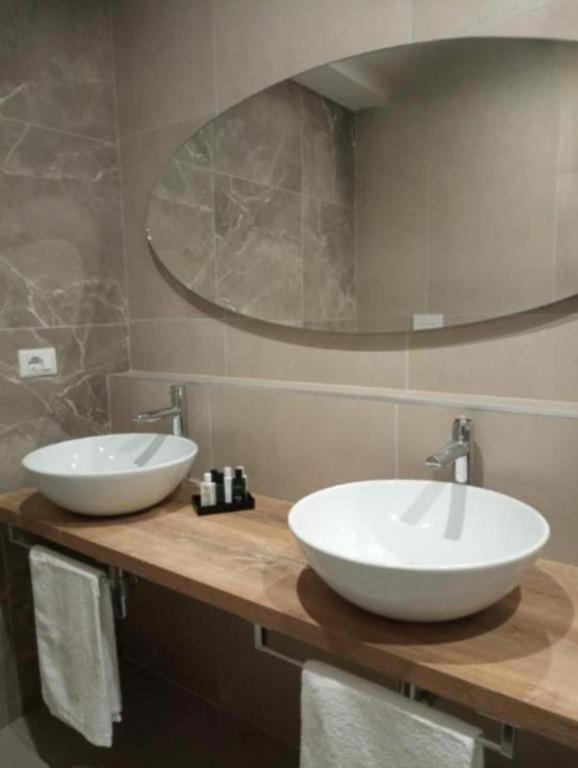 A bathroom at Luxury Apartment with balcony garden view