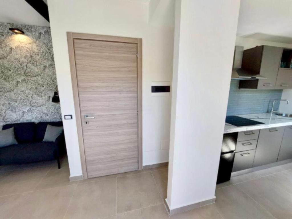 A kitchen or kitchenette at Luxury Apartment with balcony garden view